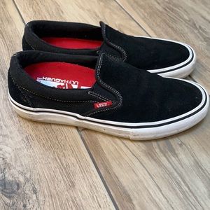 Vans black slip-on’s